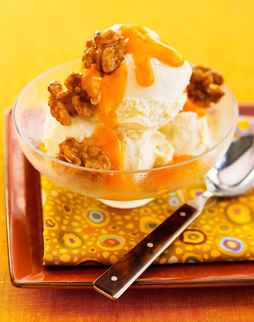 Vanilla ice cream with lemon honey and walnuts