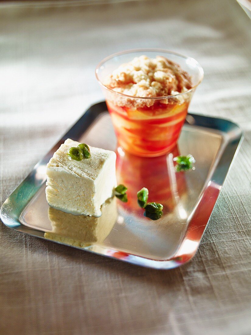 Apple dessert with a cinnamon crust served with pistachio ice cream