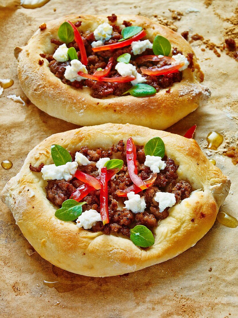 Minced lamb and feta cheese pizzas