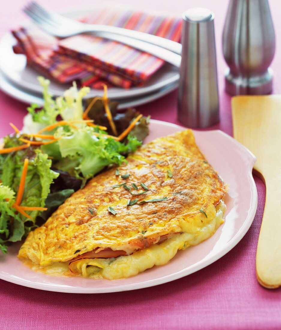 Ham and cheese omelette with a green salad