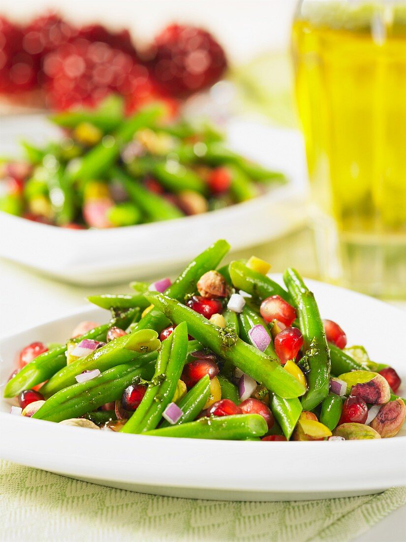 Bean salad with pistachios and pomegranate seeds