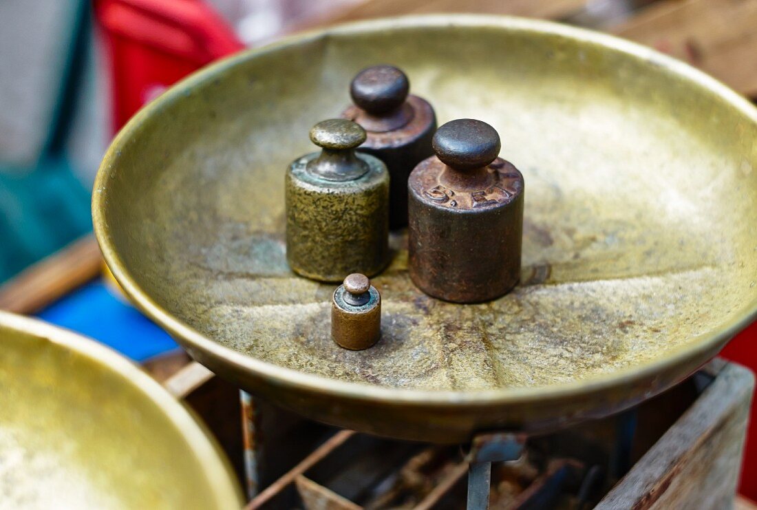 Weights on a weighing dish