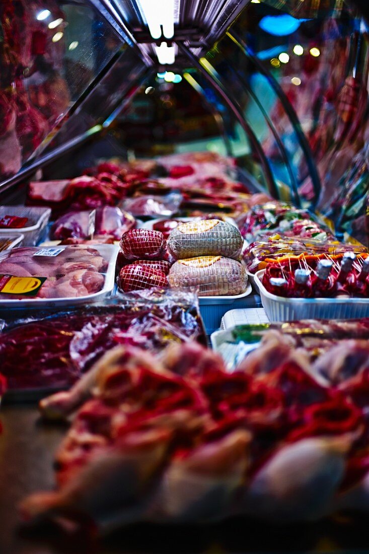 A butcher's stall at a market in Italy