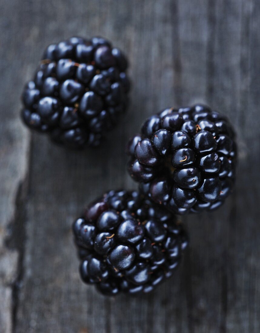 Blackberries on a wooden surface