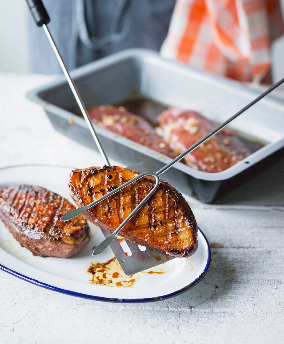 Grilled duck breasts in an oriental marinade