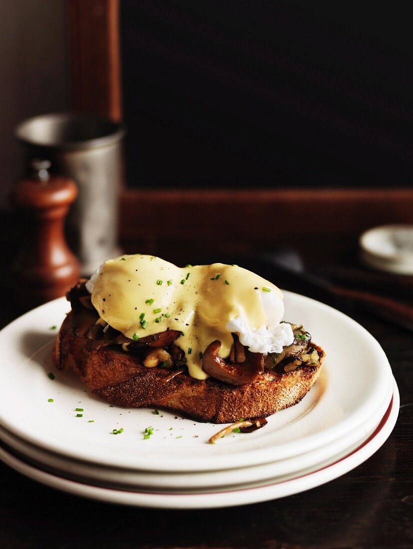 Mushrooms on toast with poached eggs and Hollandaise sauce