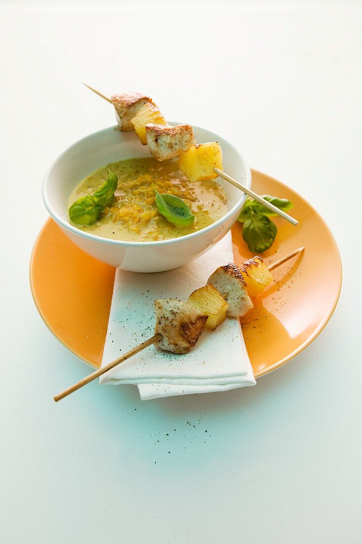Lentil curry soup with chicken skewers