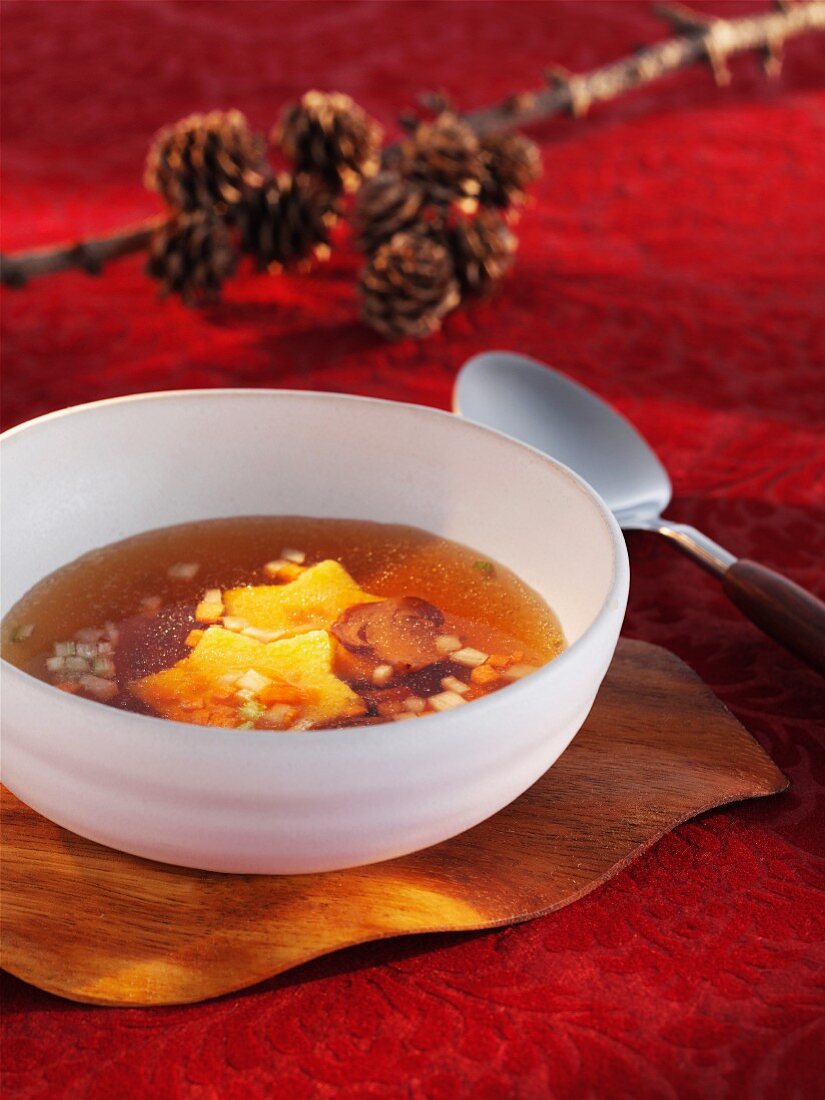 Broth with star-shaped croutons (Christmas)