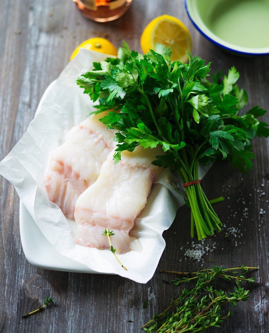 Wolffish fillets, parsley, thyme and lemons