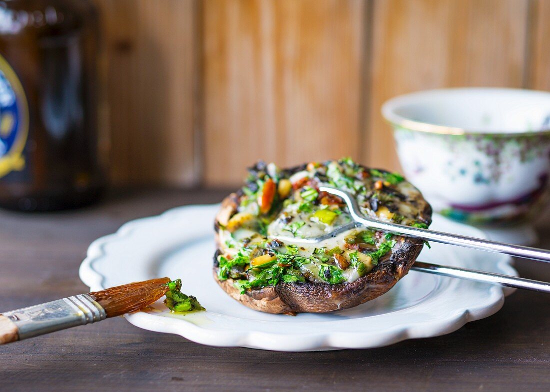 Stuffed portobello mushrooms with herbs and pinenuts