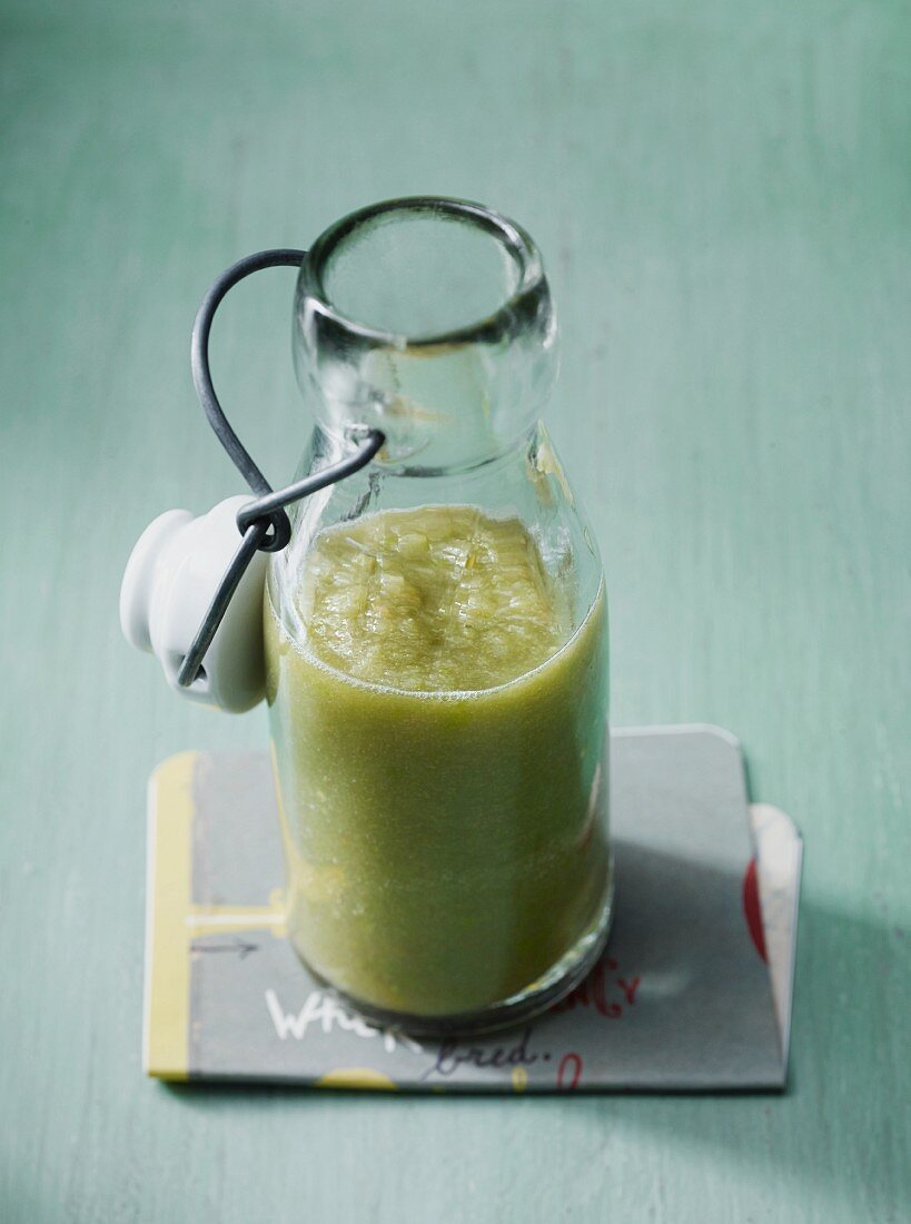 A vegetable smoothie in a flip-top bottle