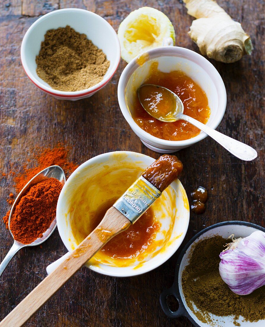 Ingredients for a marinade: garlic, ginger and apricot jam