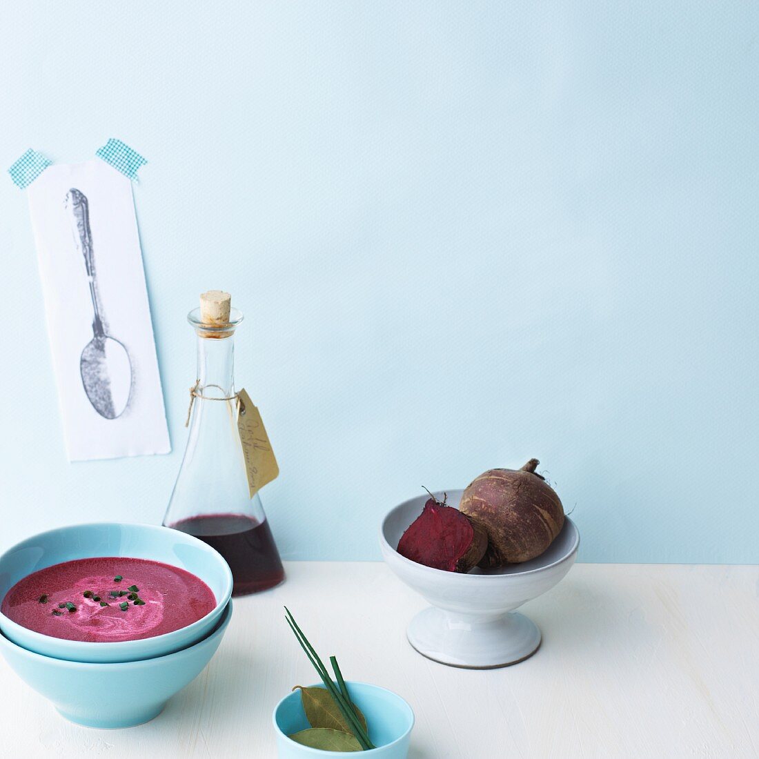 Beetroot soup with chives and bay leaves
