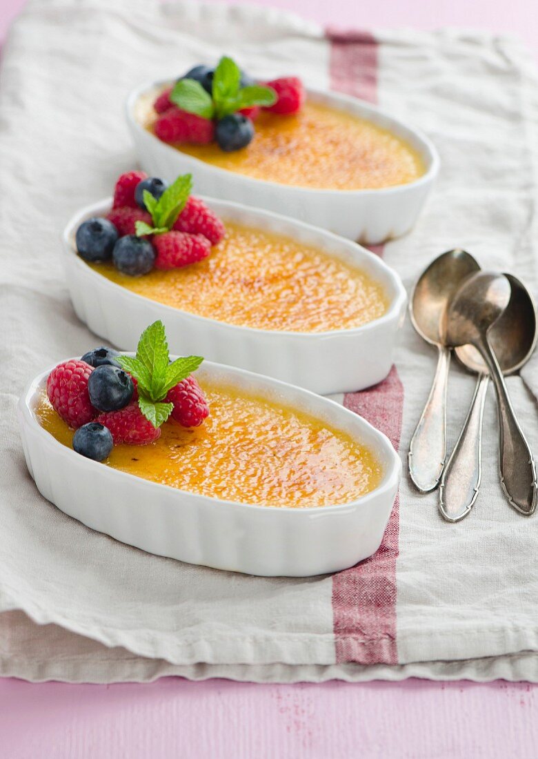 Creme Brulee with raspberries and blueberries