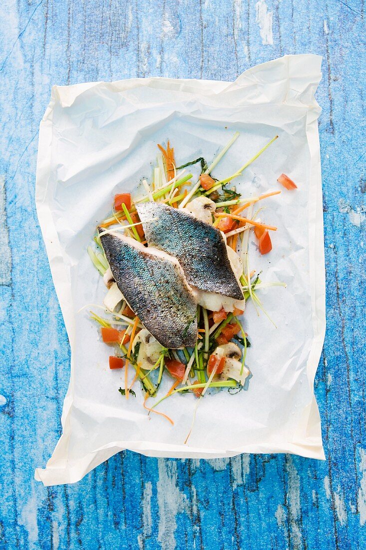 Trout cooked in parchment paper