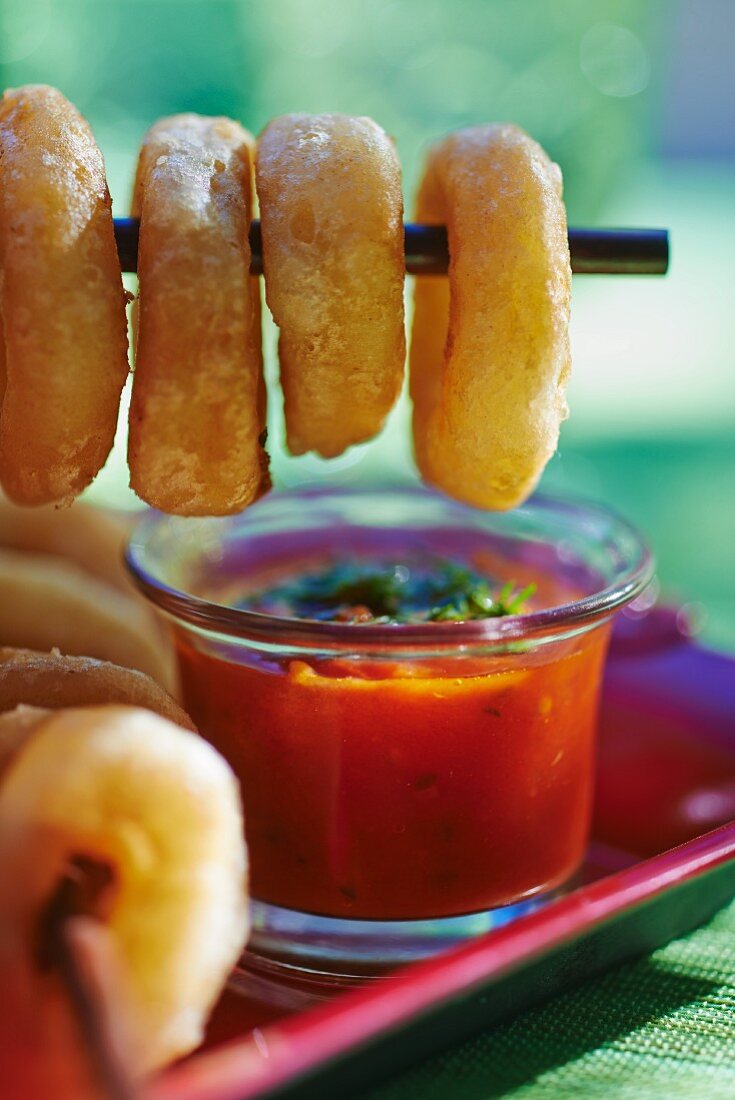 Squid rings with a spicy tomato and pepper dip