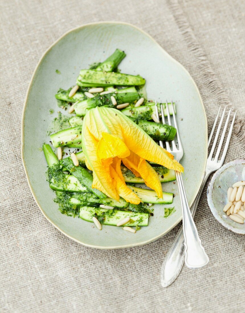 Courgette carpaccio with a courgette flower and mint