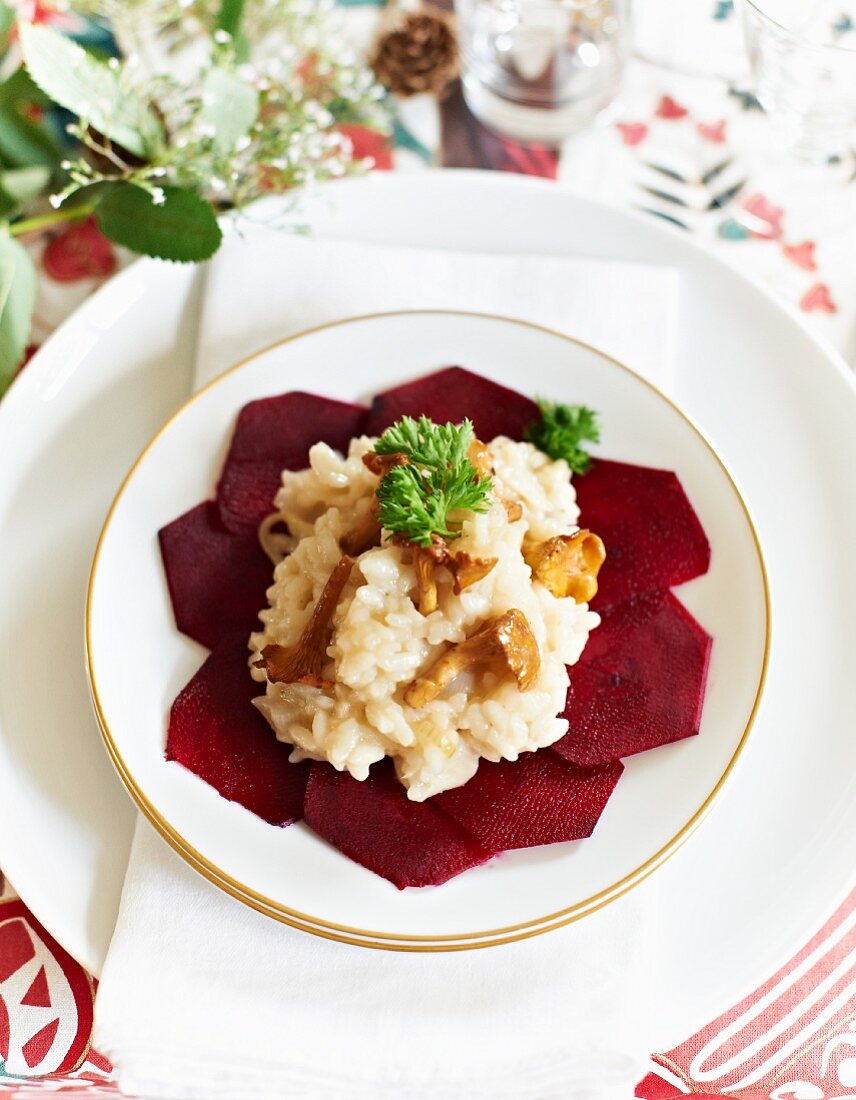 Chanterelle mushroom risotto on slices of beetroot