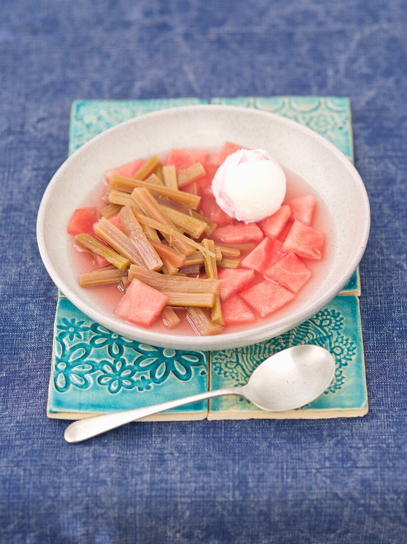 Cold watermelon and rhubarb soup with strawberry and vanilla ice cream