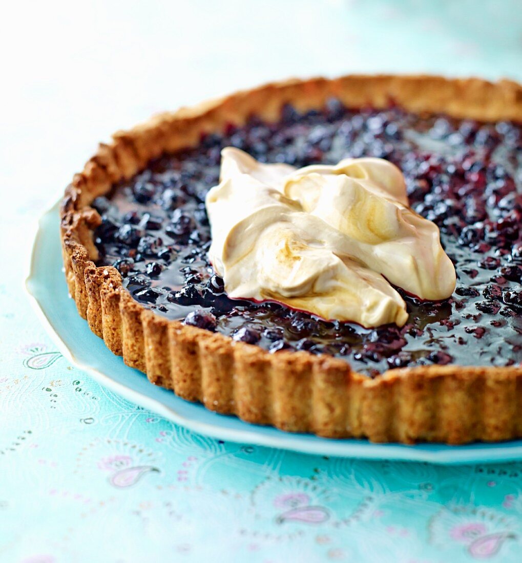 Blueberry tart with whipped coffee cream