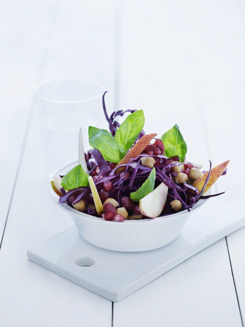 Red cabbage salad with chickpeas, apples and pomegranate seeds