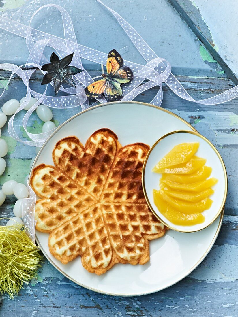 Sponge cake waffles with mango fillets