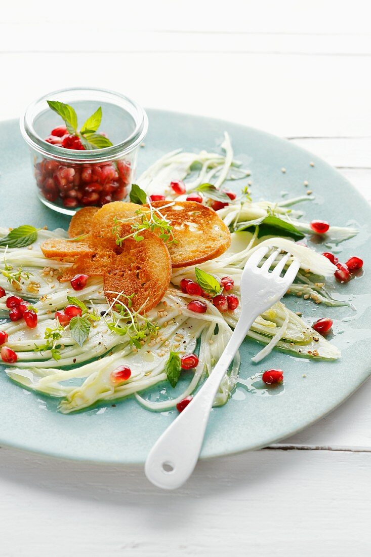 Fennel carpaccio with pomegranate seeds