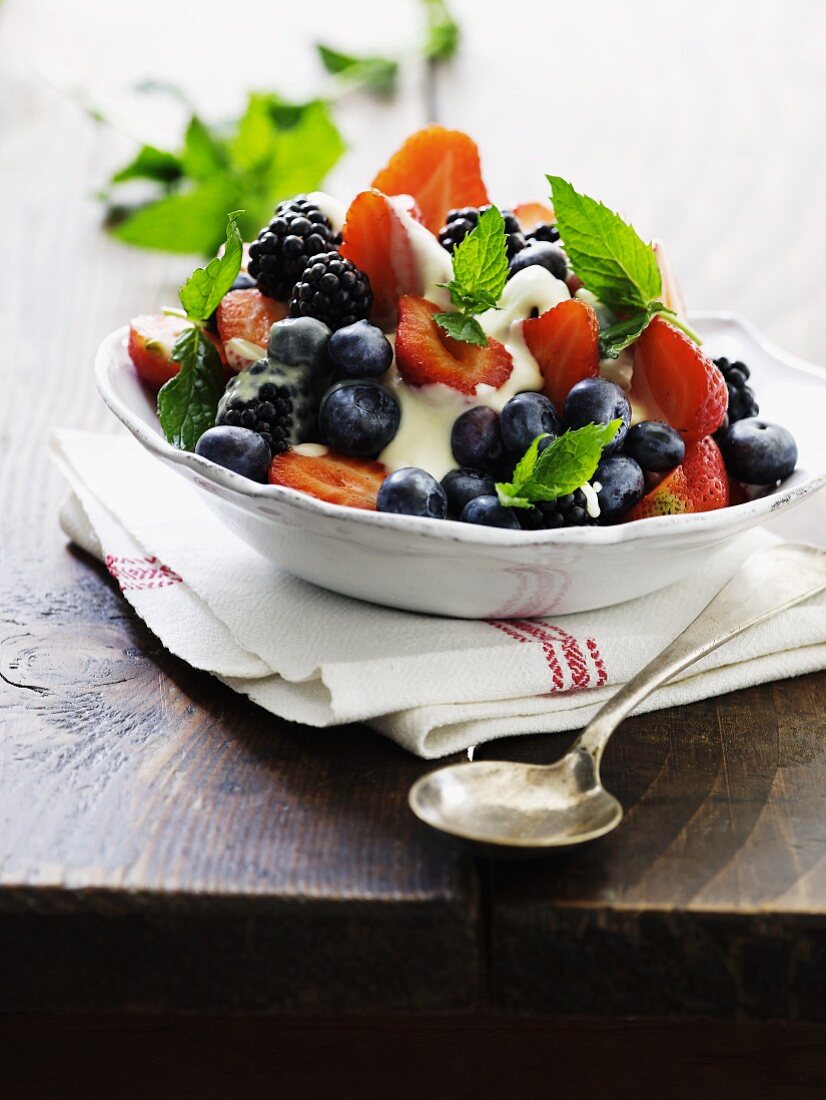 Natural yoghurt with fresh berries and mint