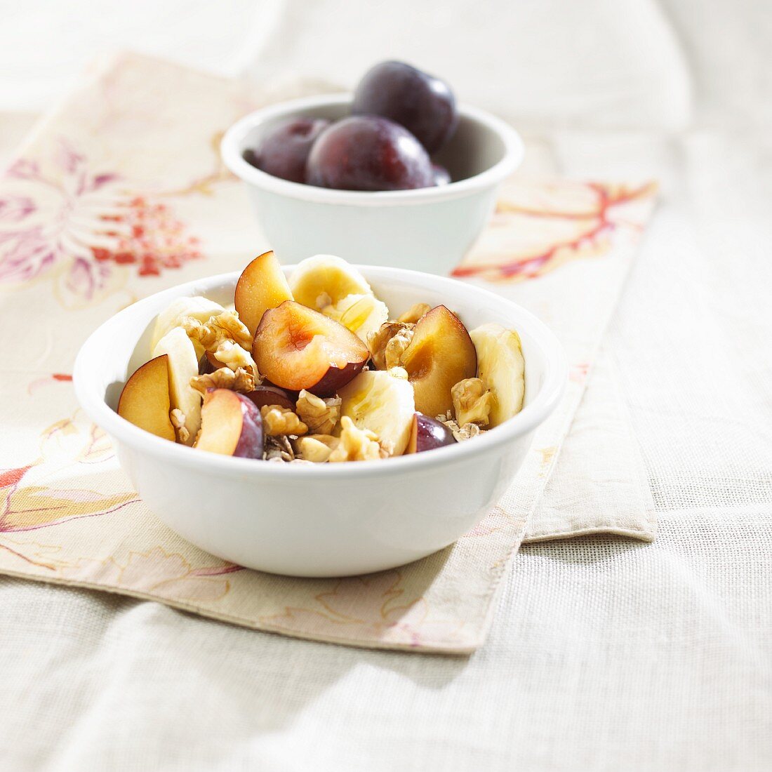 Autumnal plum muesli with walnuts