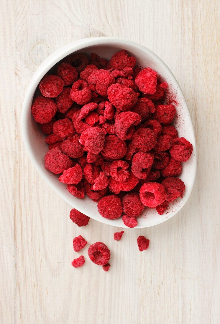 A bowl of freeze-dried raspberries (seen from above)