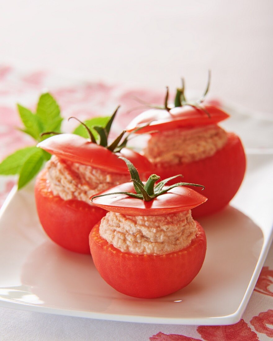 Tomatoes filled with ham cream