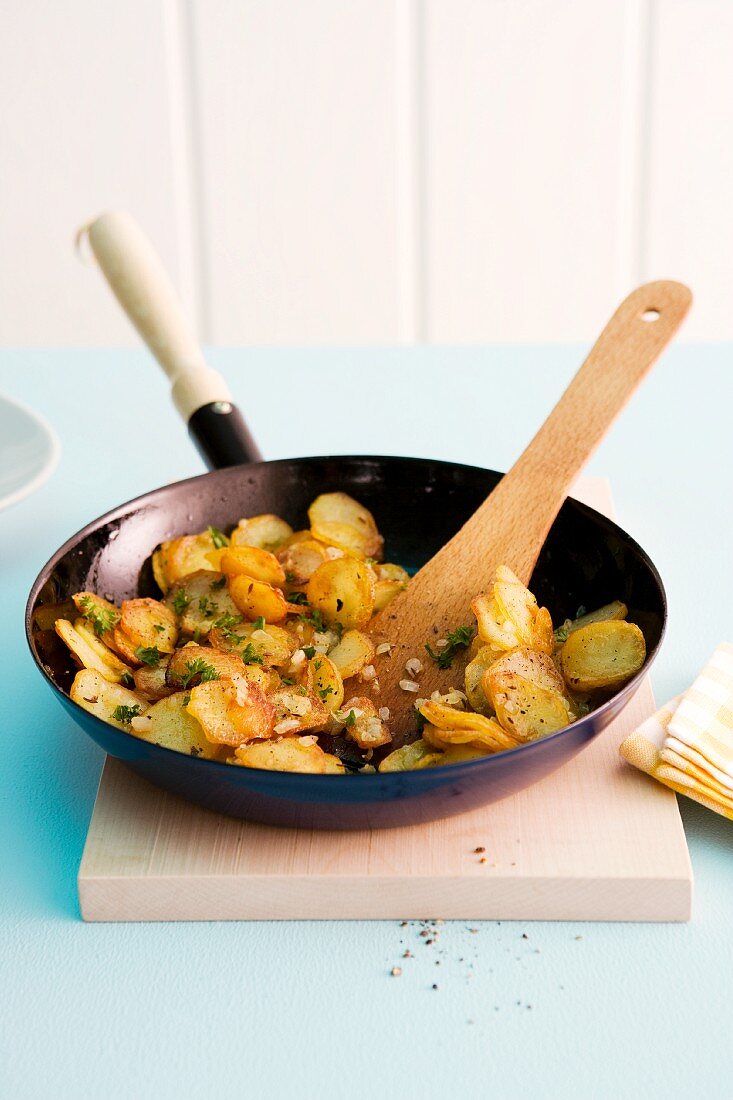 Fried potatoes in a pan