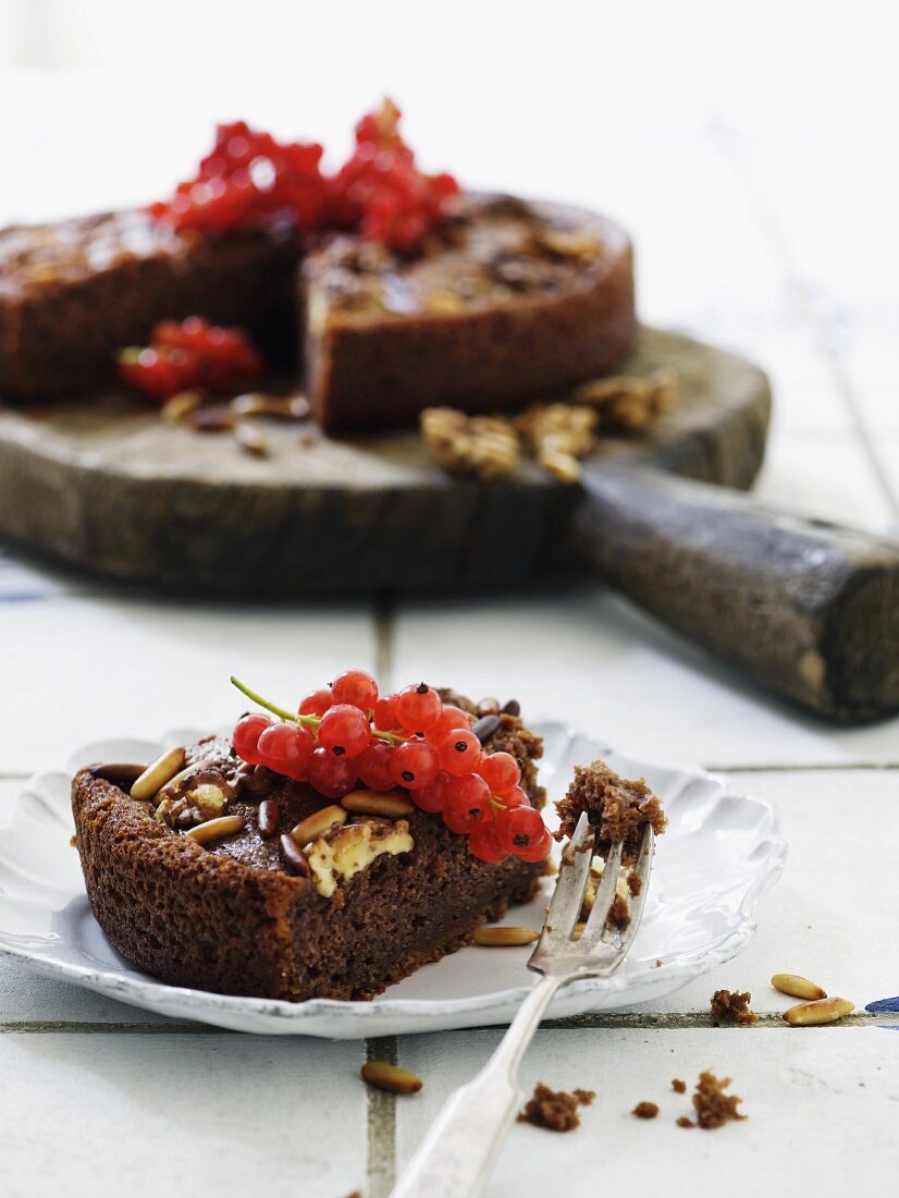 Ricotta cake with carrots and pine nuts