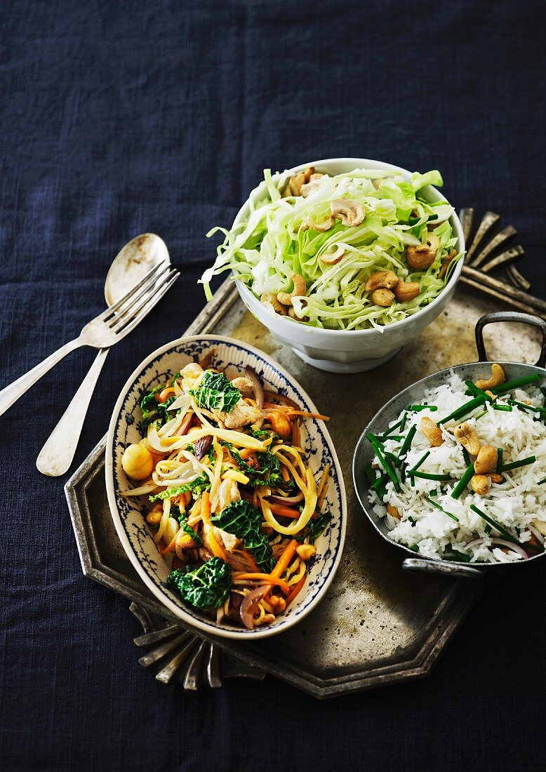 Oriental stir-fried vegetables with rice and a cabbage salad