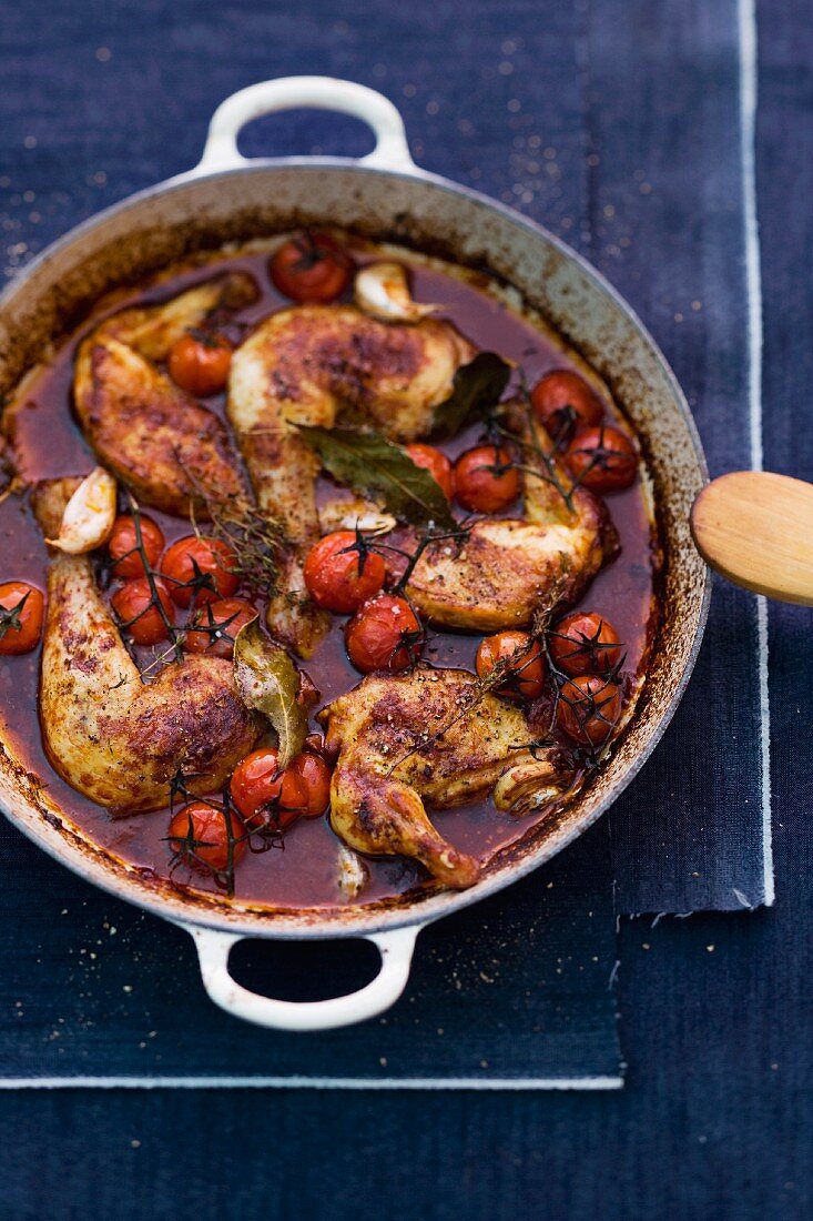 Coq au vin with cherry tomatoes