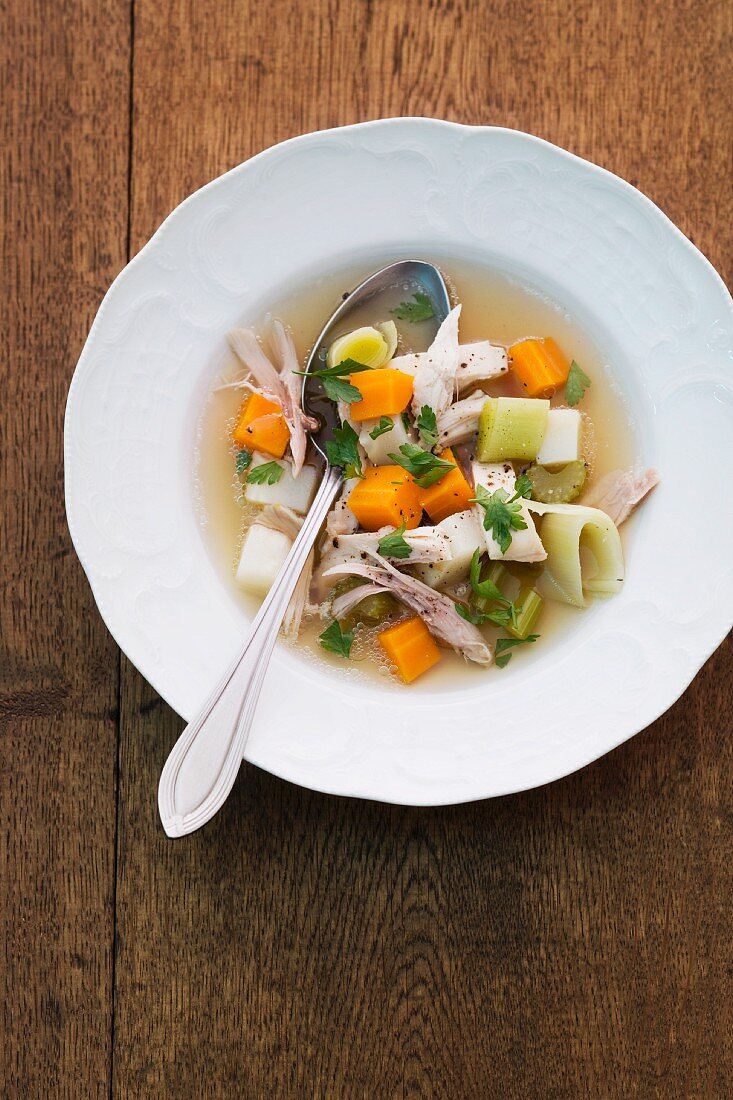 Chicken soup with carrots, celery and leek