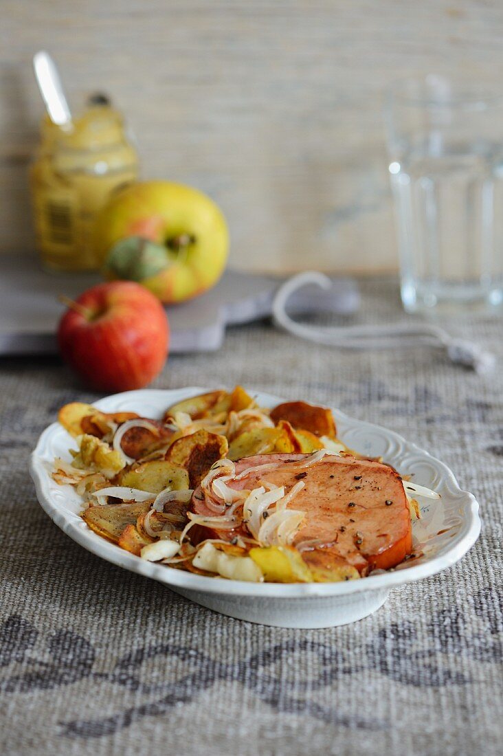Gammon with baked apple and potatoes