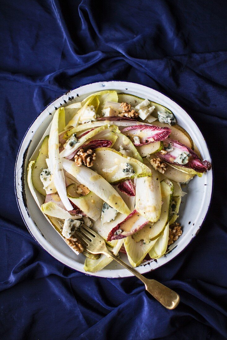 Chicory and pear salad with blue cheese and walnuts for Christmas dinner