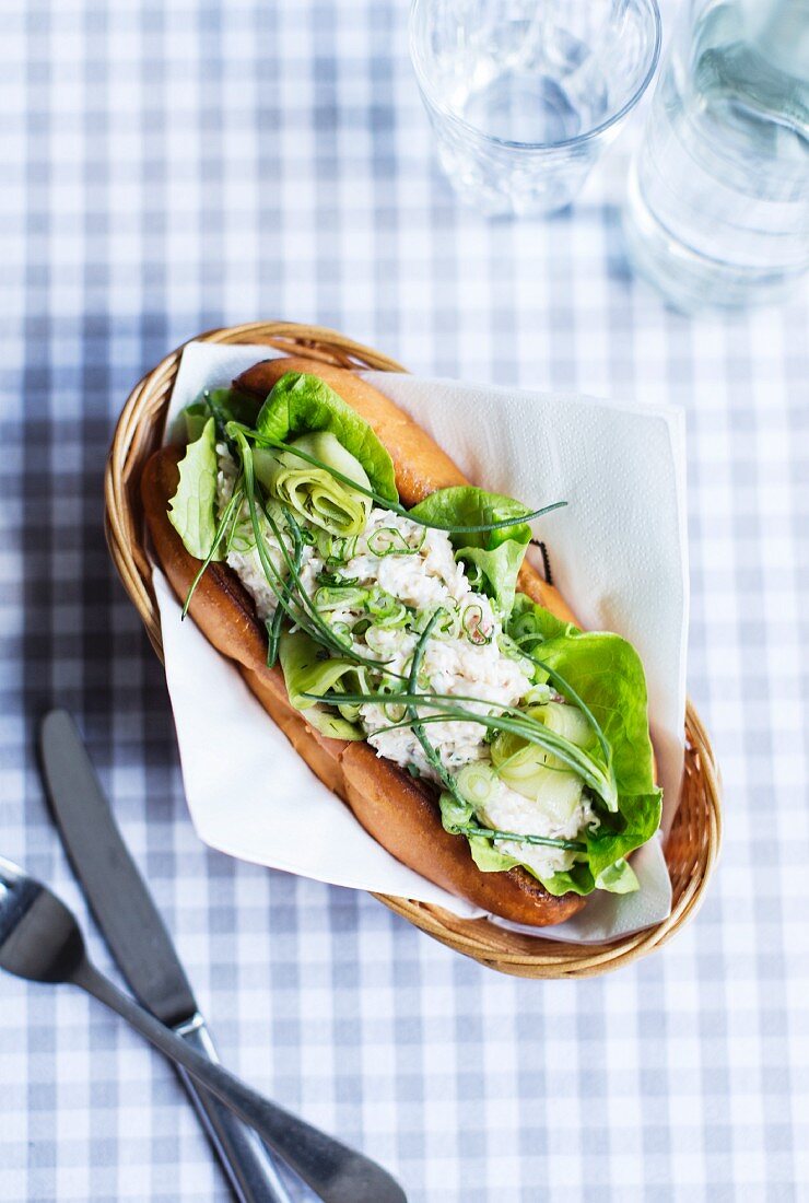 A crab roll with lettuce