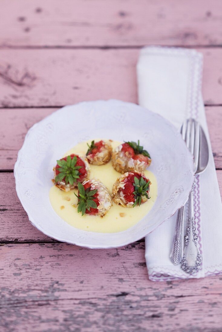 Strawberries in an elderflower foam sauce