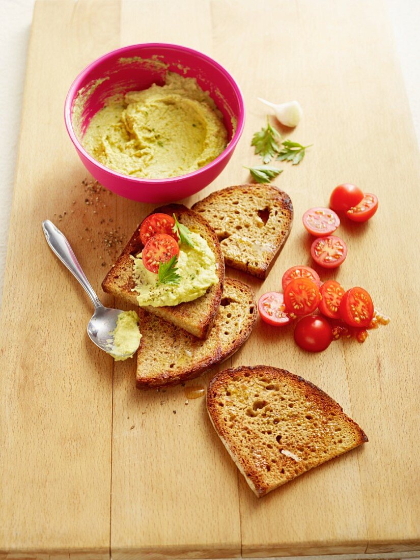 Slices of toasted bread with a chickpea spread