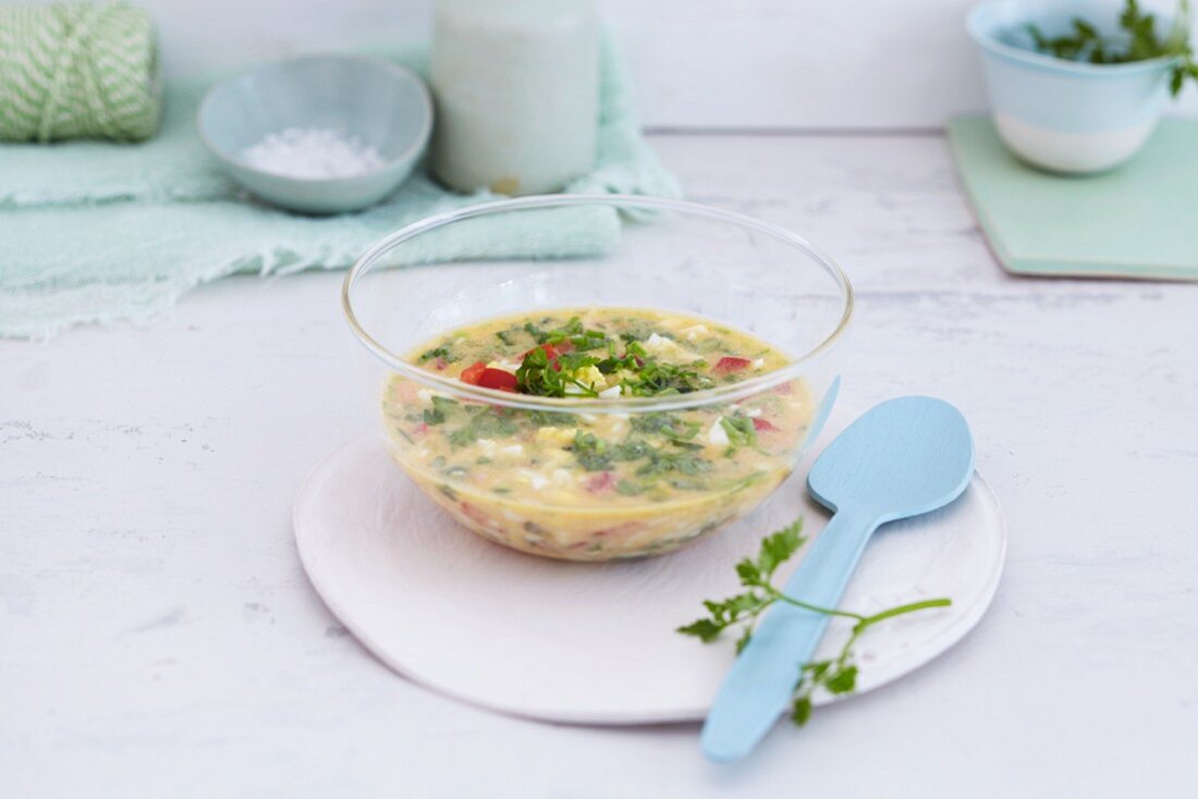 A dressing made with eggs, tomatoes and herbs