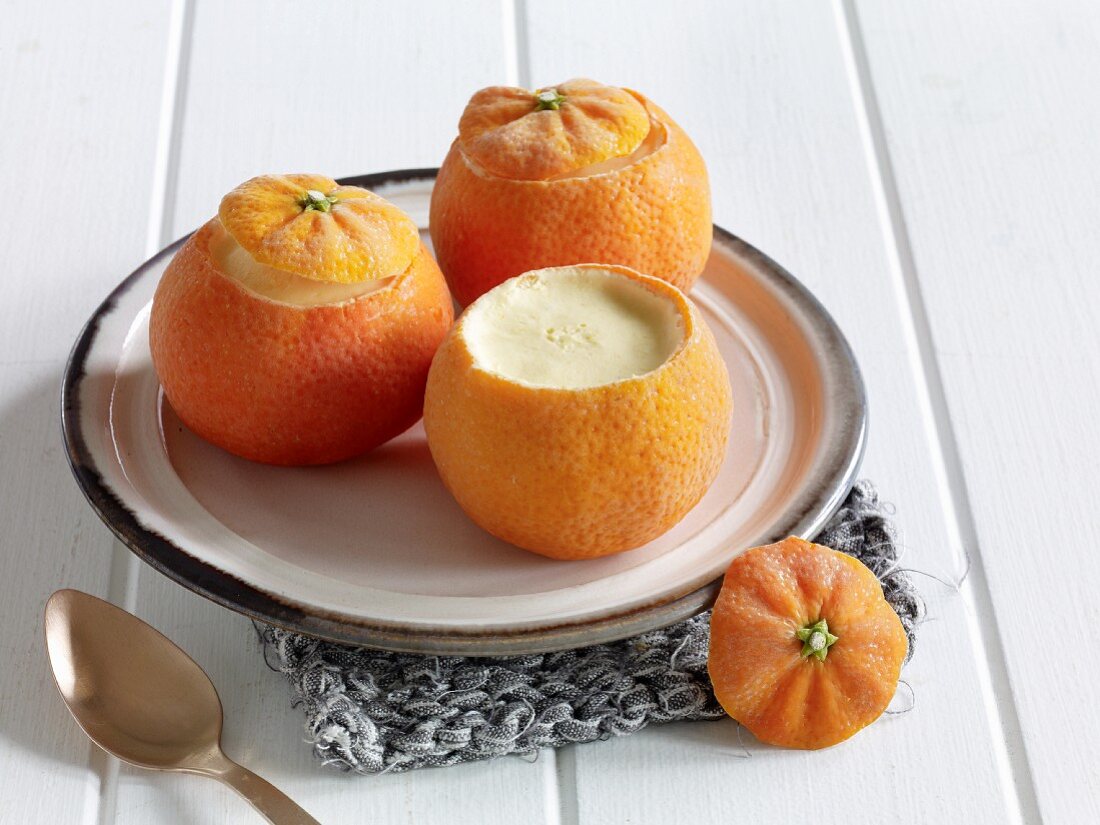 Clementine parfait served in hollowed out fruits