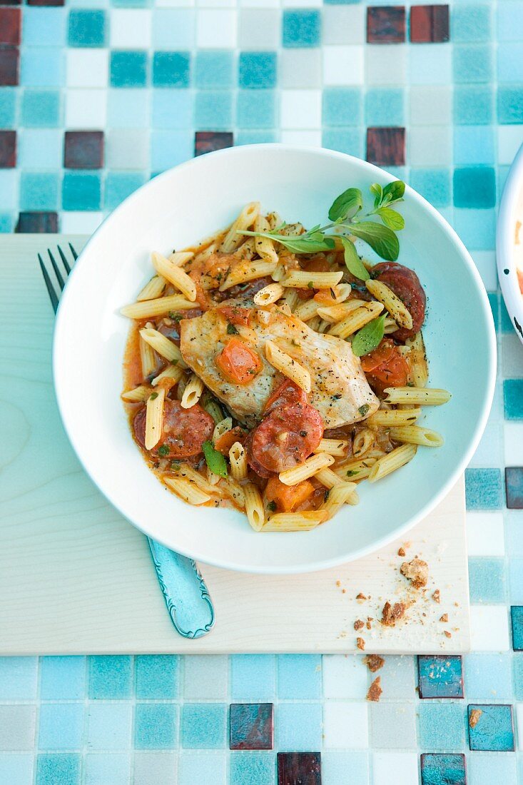 Pasta with sausage and chicken breast