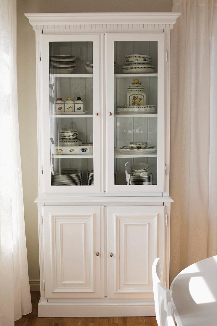 White, country-house-style, glass-fronted dresser