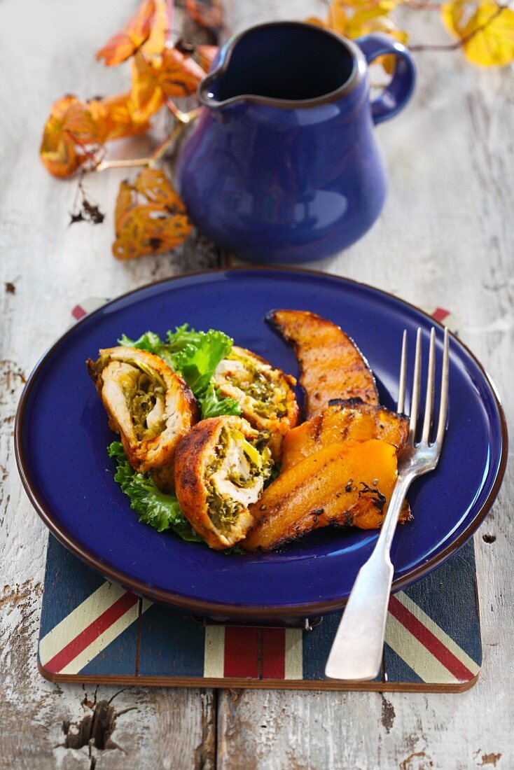Chicken roulade with green kale and smoked fish (England)