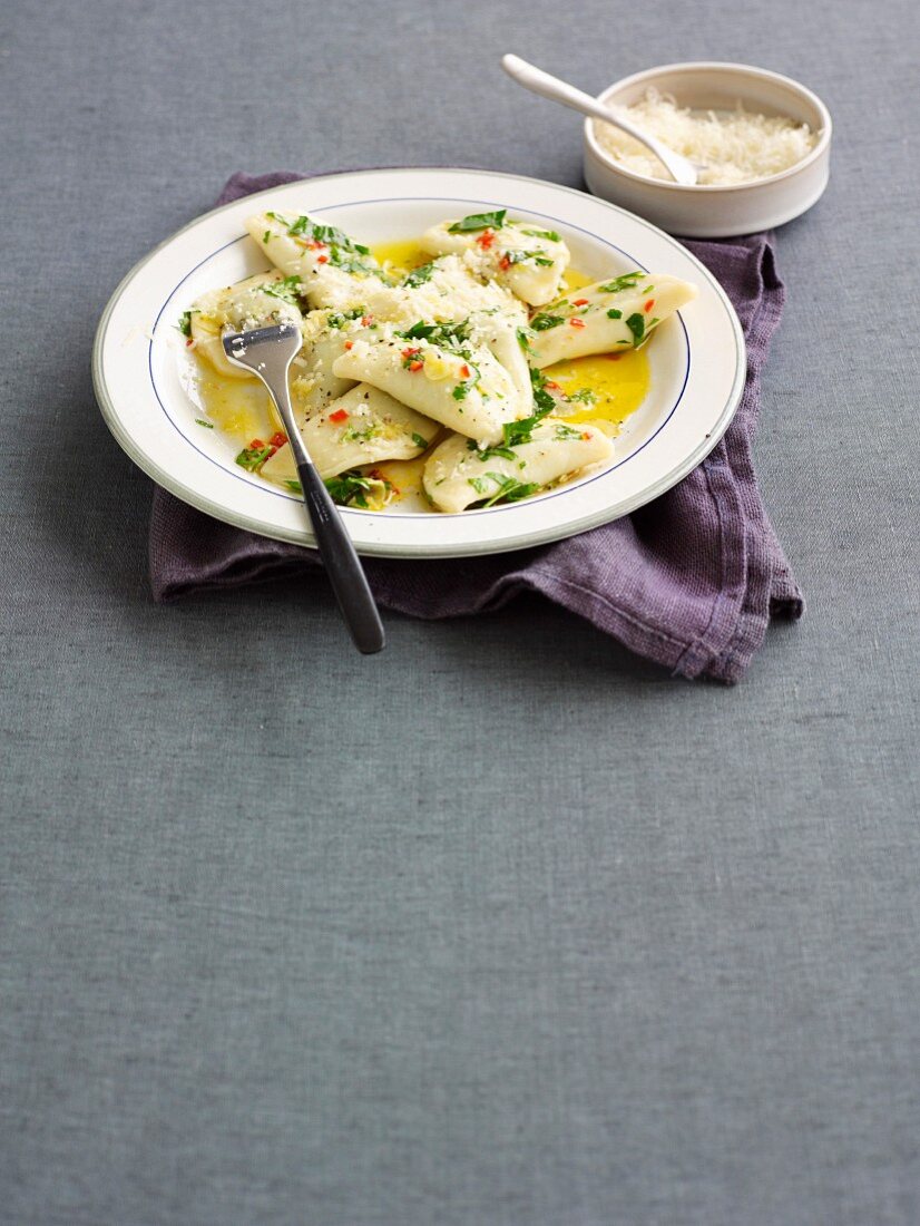 Potato dough ravioli with rocket pesto