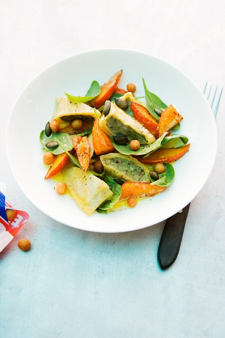 Pumpkin ravioli salad with an orange dressing