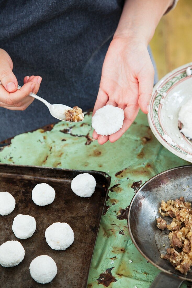 Tapioca dumplings filled with water chestnuts being made