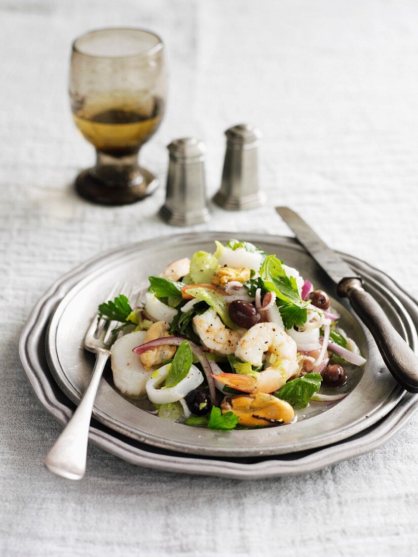 Seafood salad with olives (Italy)
